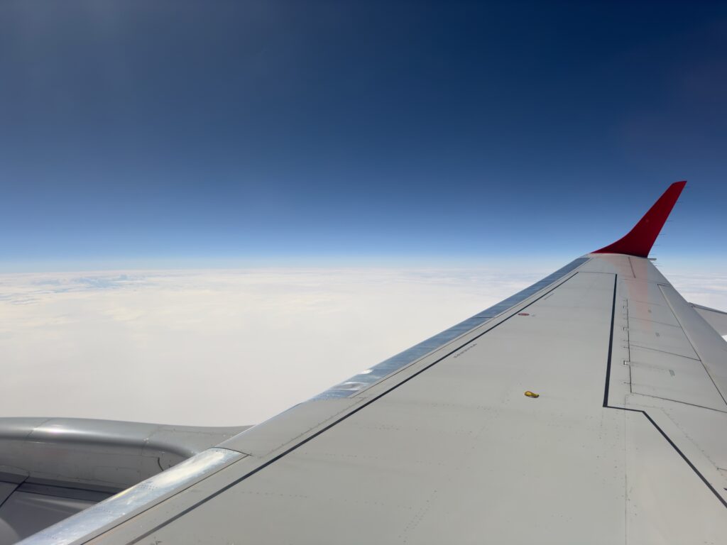 Aircraft wing and clouds