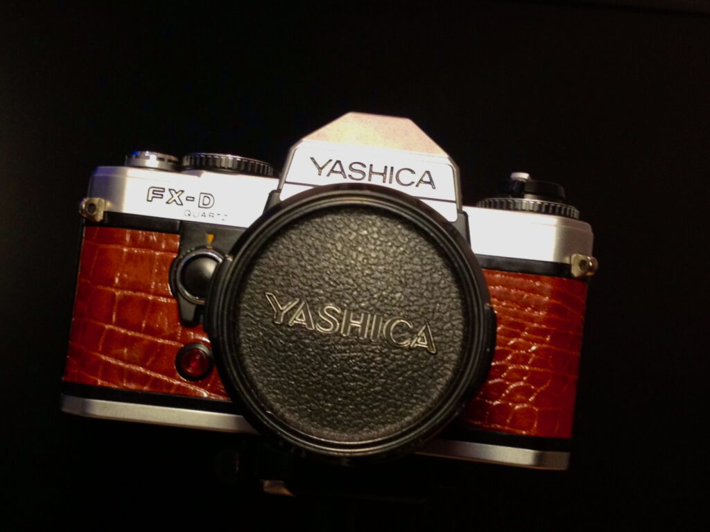 Yashica FX-D Quartz 35mm camera, with brown lizard covering