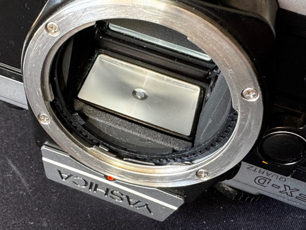 Yashica FX-D lens mount area, showing the focus screen and mirror buffer