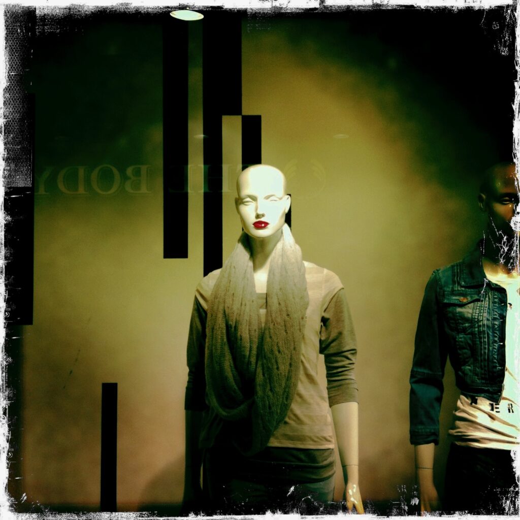 Female mannequin in a shop window.