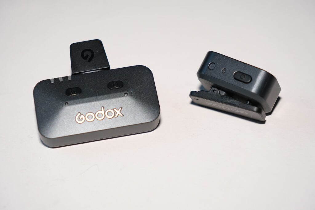 Wireless receiver on the left, mic on the right.