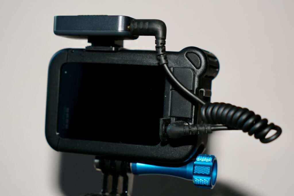 Wireless mic receiver mounted on a GoPro 