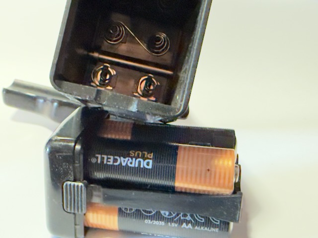 The Yashica FX Series motor drive battery compartment